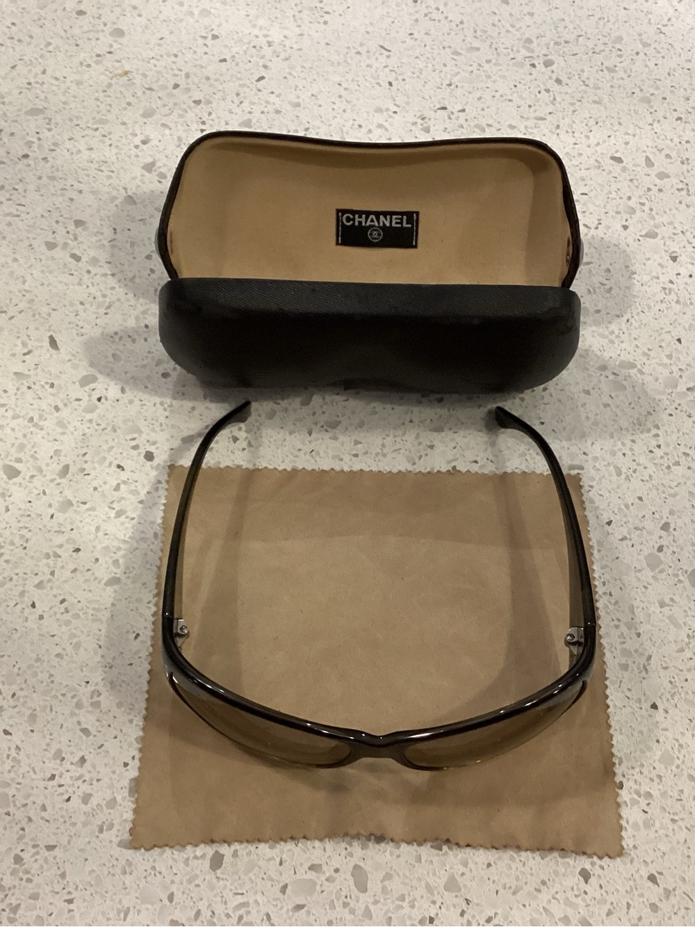 CHANEL woman Sunglasses in Black with Black Case
